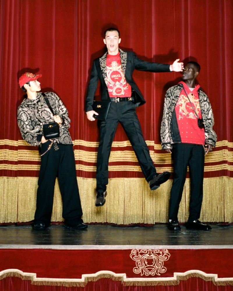 Hitting the stage, Brando Erba, Kit Butler, and Ismael Savane front Versace's holiday 2022 campaign.