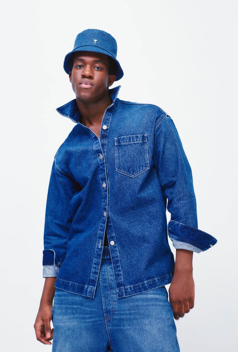 Wisdom Kaye doubles down on denim for AMI Paris' new campaign. 