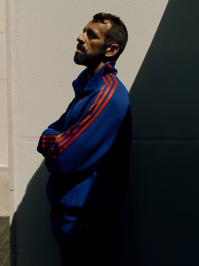 Lucas Puig sports a blue tracksuit for the Y-3 x Palace campaign.
