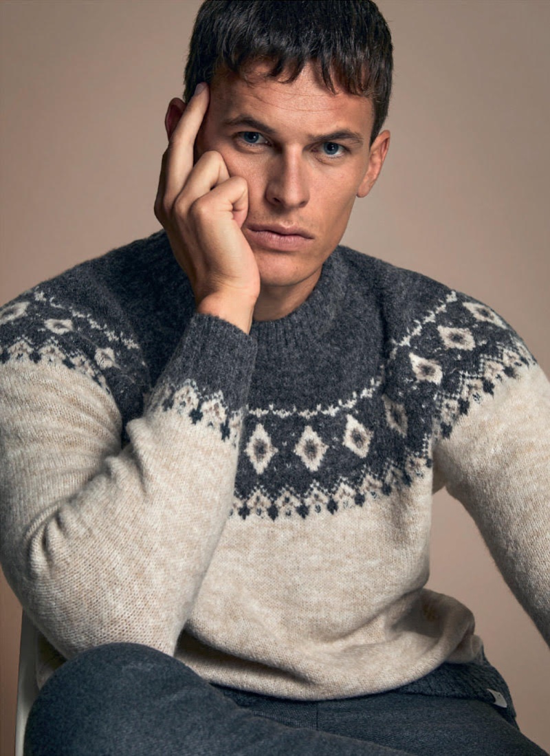 Model Maximilian Wefers dons a cozy sweater available from ZWICKER.