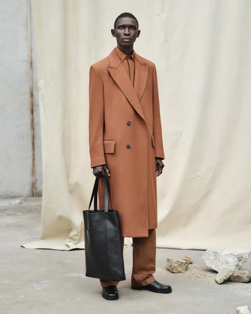 Fernando Cabral wears a brown monochrome number, including a sharp double-breasted coat from the Zara Edition capsule collection.