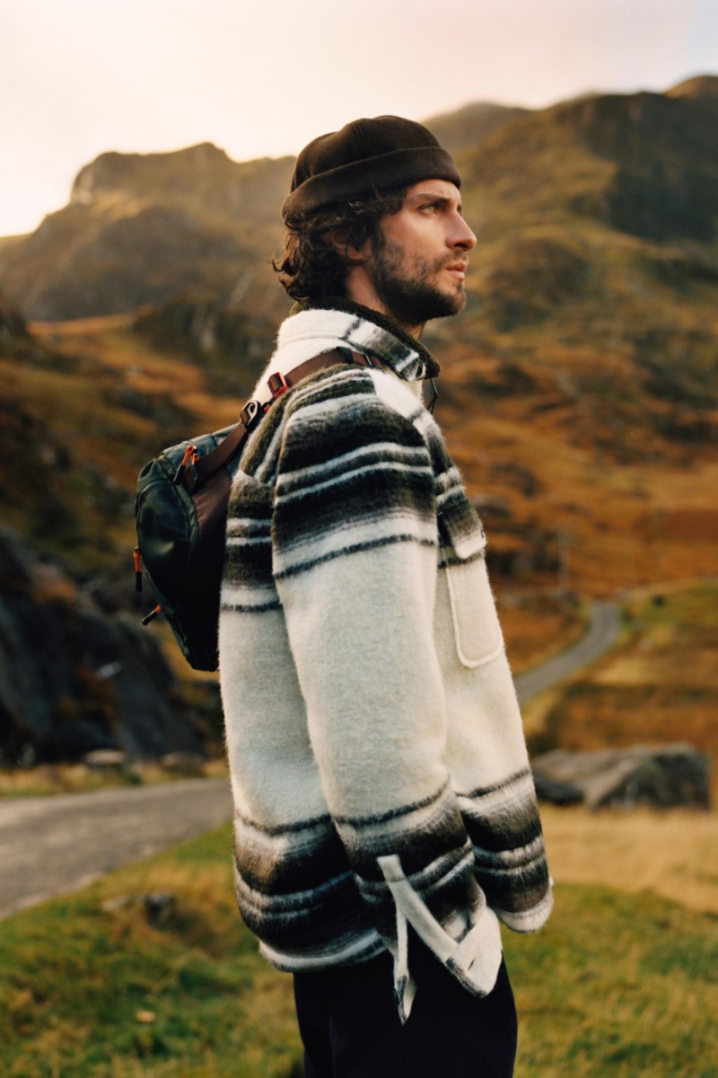Matthew Bell wears a striped overshirt with cargo pants and a nylon sport crossbody bag. » Outdoor Adventures with Zara Man Matthew Bell wears a striped overshirt with cargo pants and a nylon sport crossbody bag.