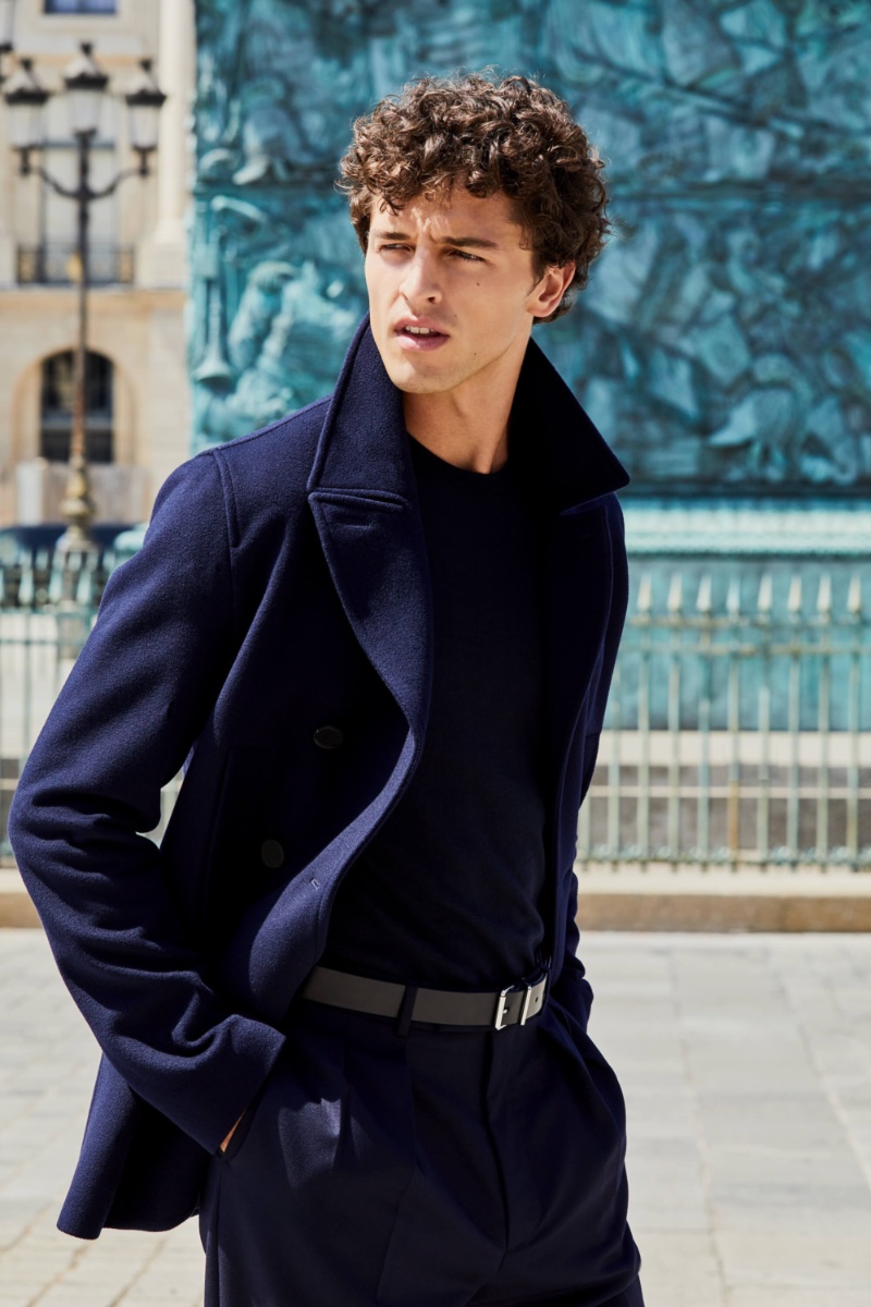 Embodying the Boucheron man, Alberto Perazzolo is a sleek vision in a monochrome navy look for the Boucheron Singulier fragrance campaign. 