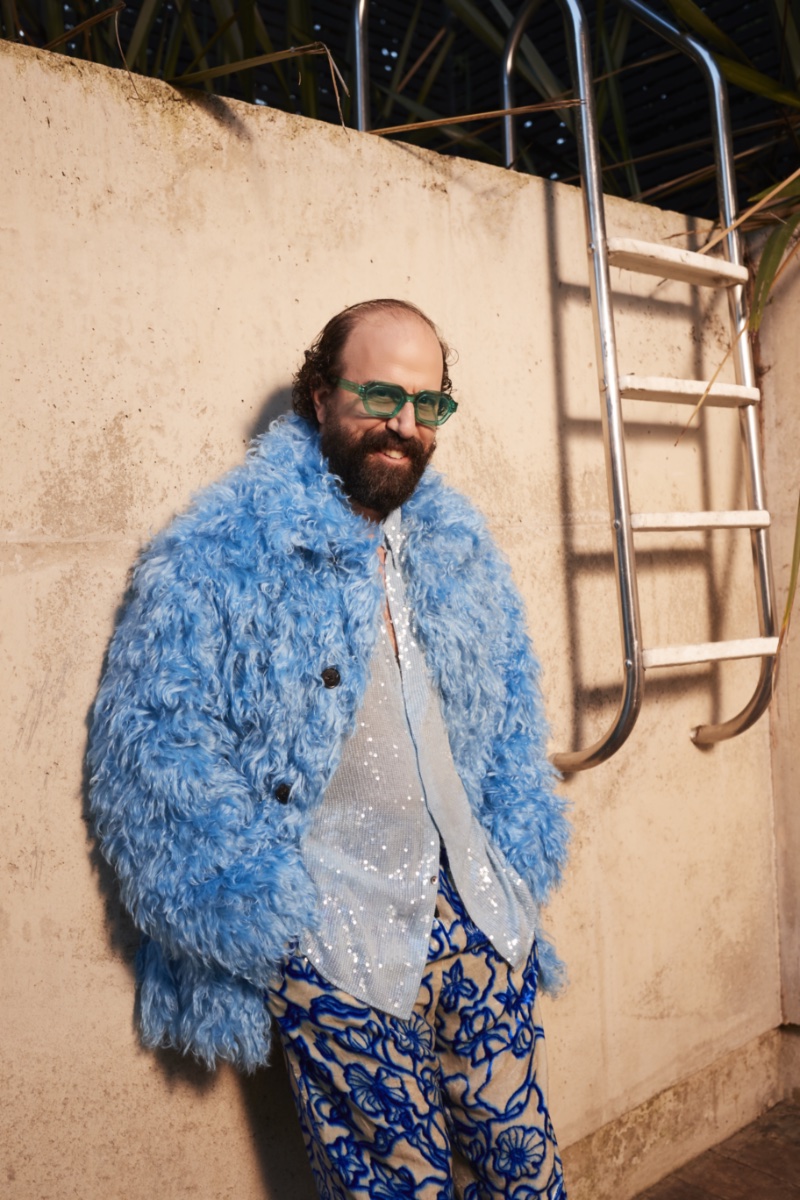 Embracing bold style, Brett Gelman dons a Dries Van Noten jacket, sequined shirt, and floral-print velvet trousers with RETROSUPERFUTURE sunglasses. » Brett Gelman for Mr Porter: His Take on Fame, Style & Reality Embracing bold style, Brett Gelman dons a Dries Van Noten jacket, sequined shirt, and floral-print velvet trousers with RETROSUPERFUTURE sunglasses.