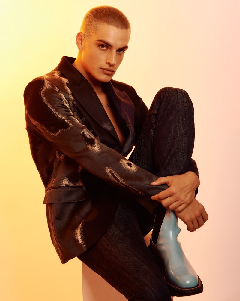 Cameron Porras Mens Folio 007 Dressed to impress, Cameron Porras dons a Fendi blazer with Burberry pants and Alexander McQueen boots.