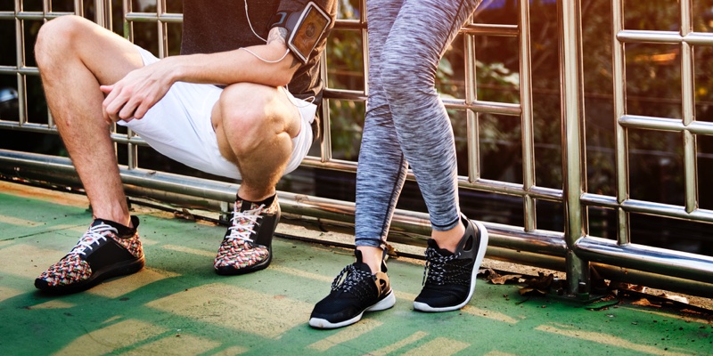 couple workout sneakers cropped