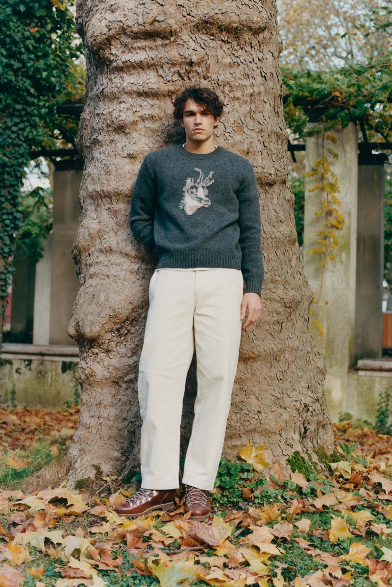 In front and center, Balthazar Dib models a chamois jacquard sweater from De Bonne Facture's Alpine capsule collection.