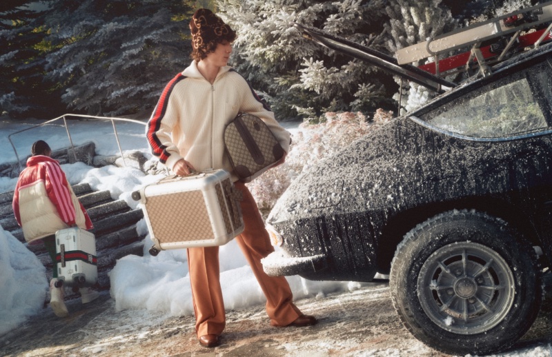 Paul-Emile Paillier removes his designer luggage from the car for the Gucci Après-ski campaign.