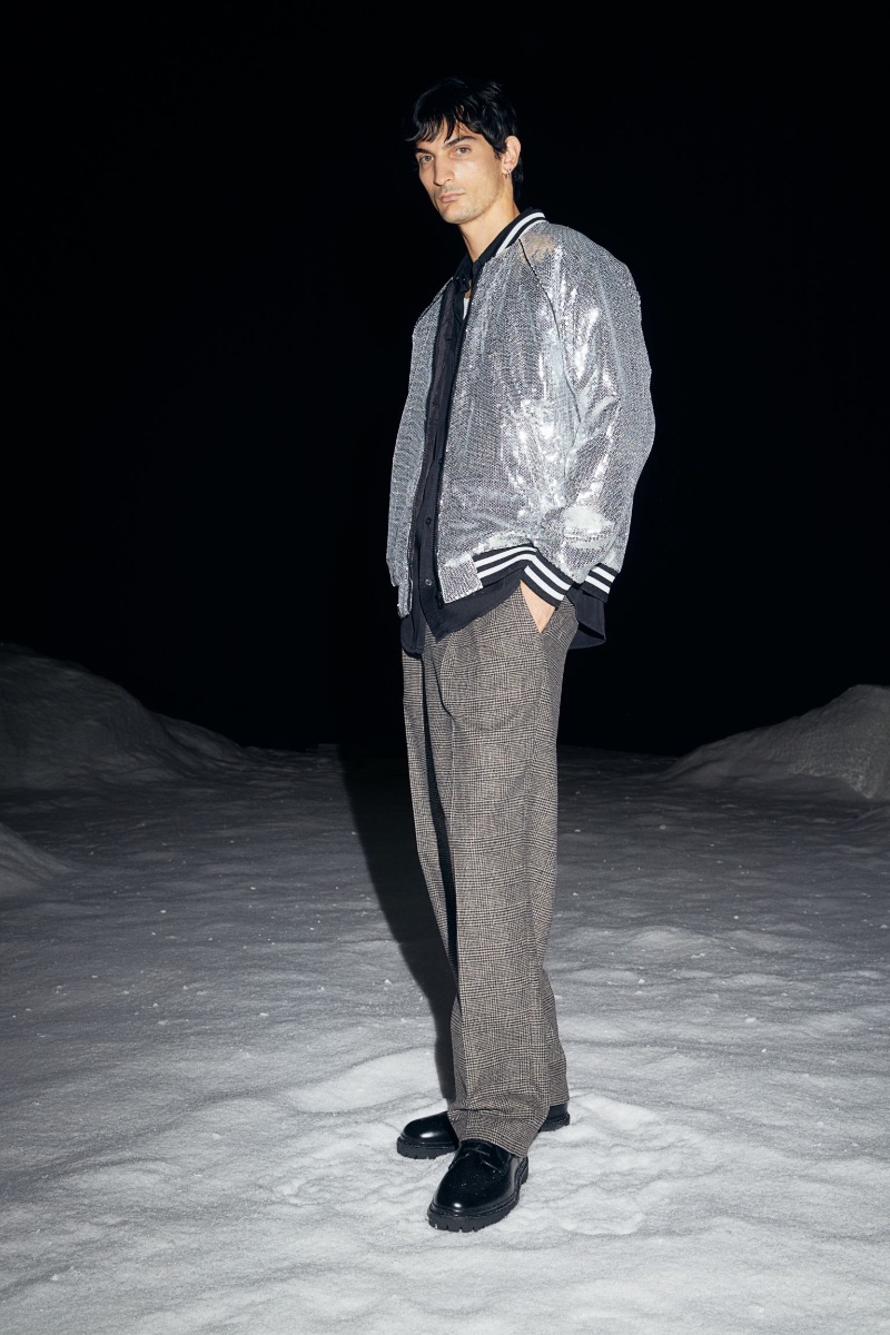 Ready to make a splash for the holidays, Luca Lemaire wears H&M's sequined bomber jacket with wide-cut trousers. » Party Time! Explore H&M's Newest Men's Looks Ready to make a splash for the holidays, Luca Lemaire wears H&M's sequined bomber jacket with wide-cut trousers.