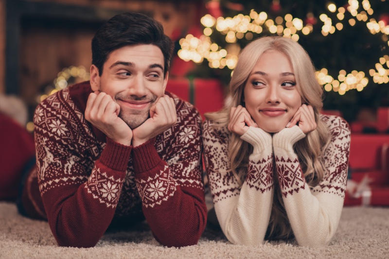 holiday couple festive sweaters