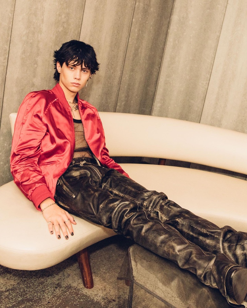 Landon Barker stretches out his legs in a pair of Dsquared2 leather pants.