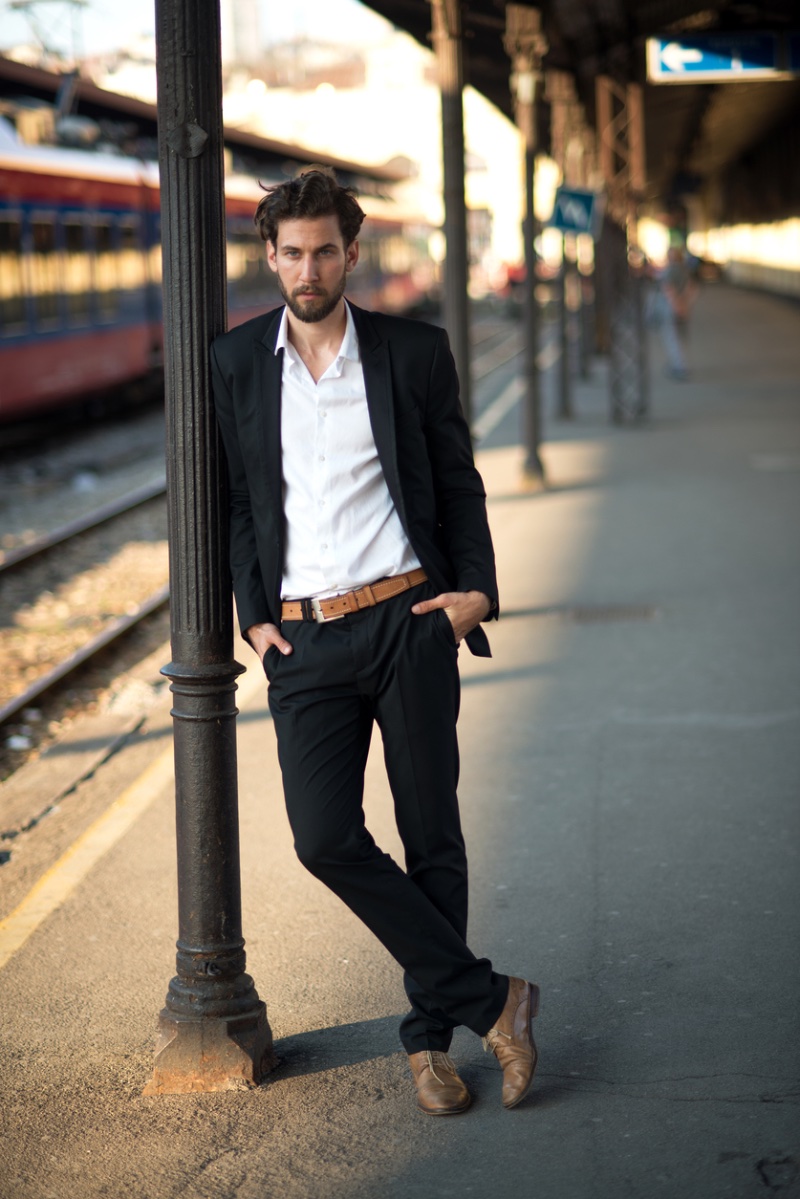 Black suit with brown belt and shoe