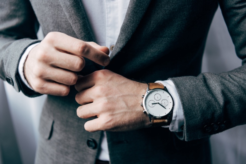 man wearing watch with brown leather strap » Watches: What Are the Best to Invest in? man wearing watch with brown leather strap