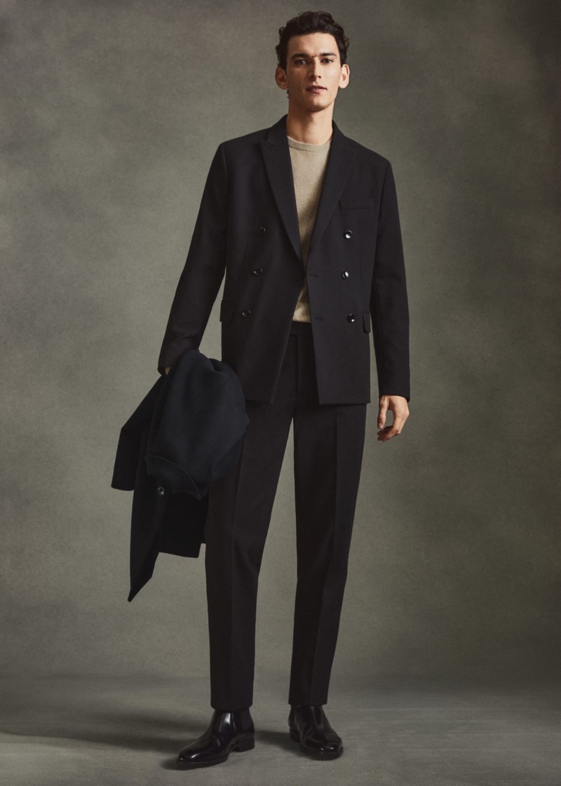 Neutral Color Outfits for Men: Mango Man makes a case for the classic black suit with a double-breasted style.