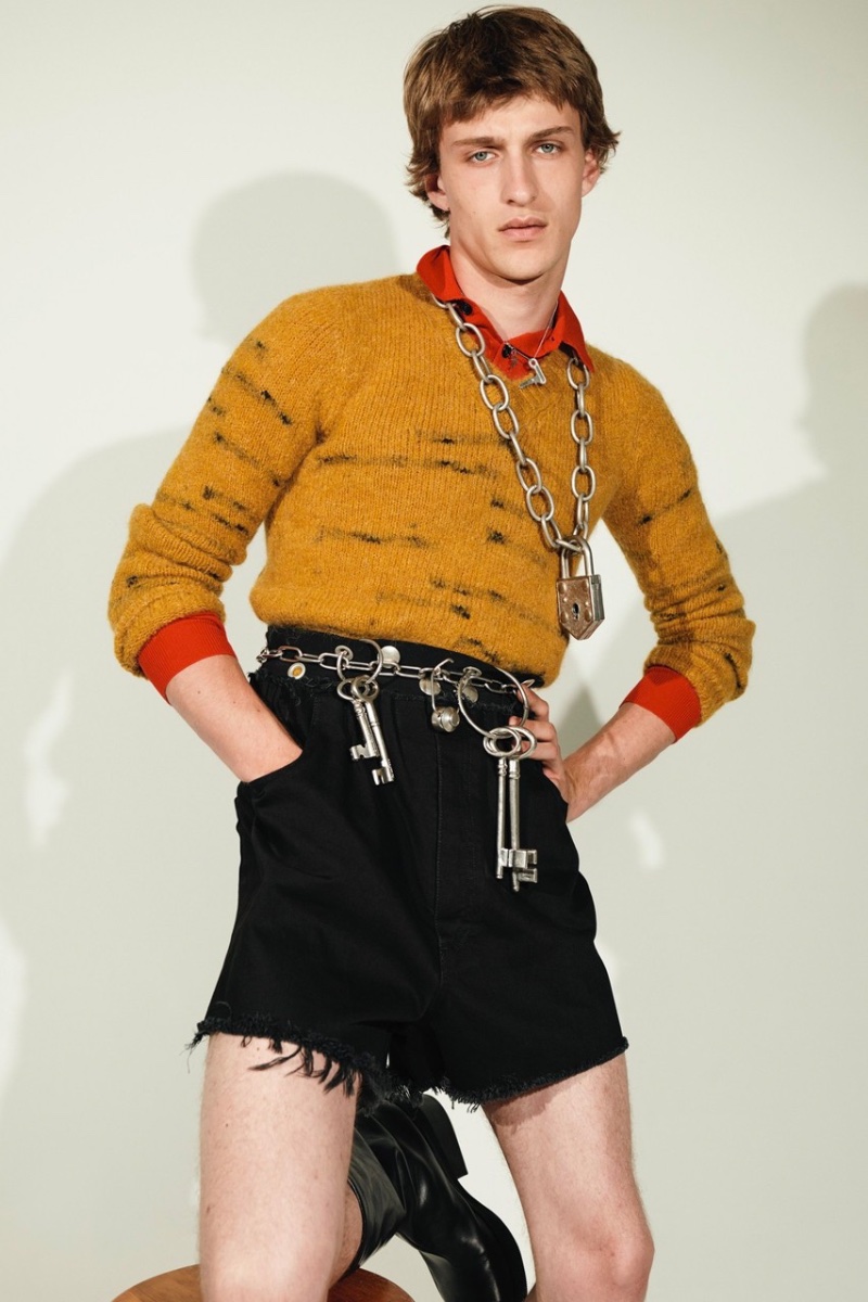 Rocking high-waist cut-off shorts, Vasko Luyckx fronts the Raf Simons spring-summer 2023 campaign.