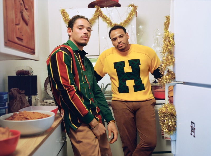 Sharing the spotlight with his brother, Anthony Ramos dons a monogram rugby from his Tommy Hilfiger holiday 2022 capsule collection.