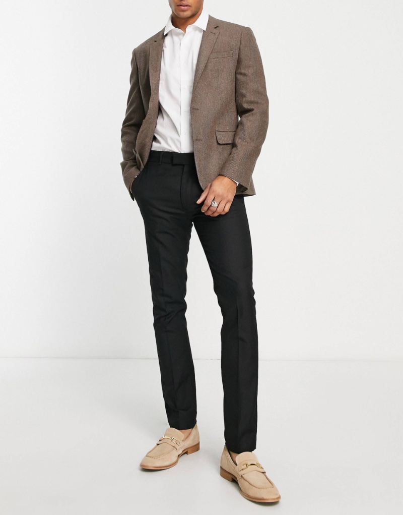 These black suit trousers from Topman look great with tan loafers and a brown suit jacket. 