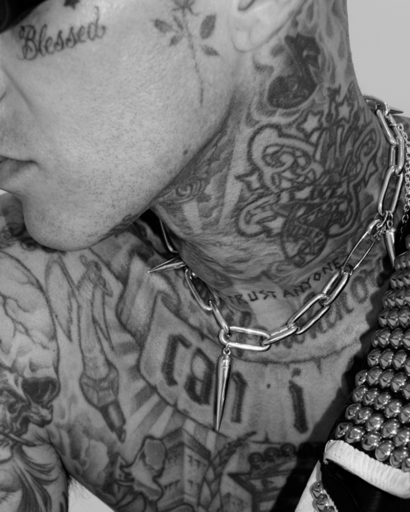 Ready for his close-up, Travis Barker wears the Clocks + Colours Pierce chain necklace.