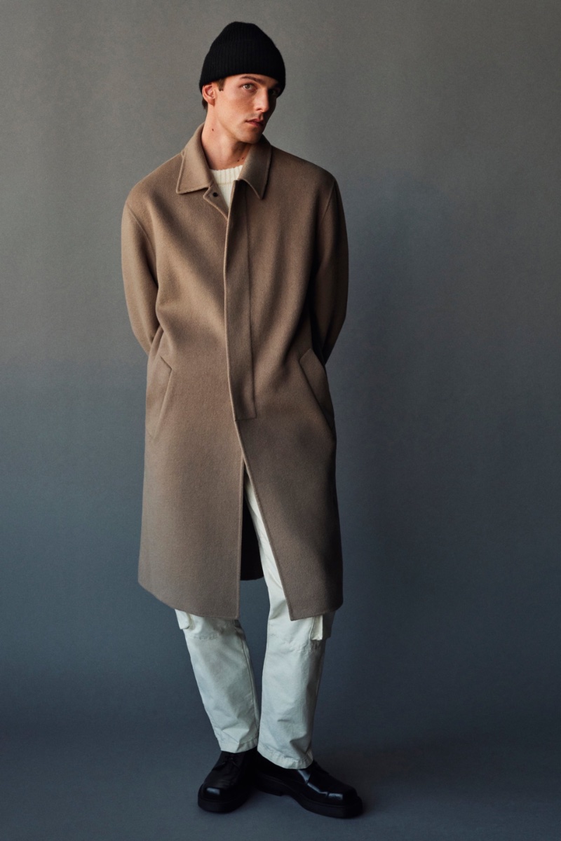 Model Quentin Demeester sports a Zara double-sided wool coat.