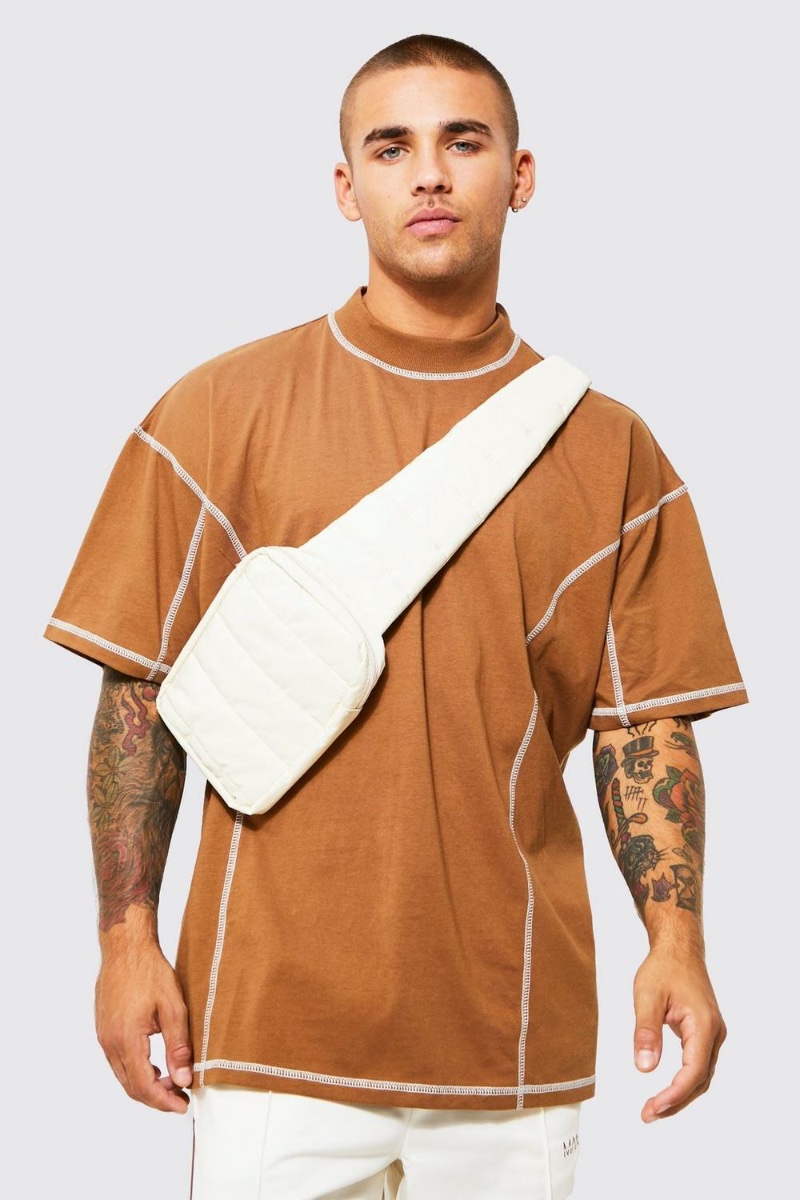 Elevate your look with a white cross body bag. » All White Outfits for Men: The Essential Style Guide Elevate your look with a white cross body bag.