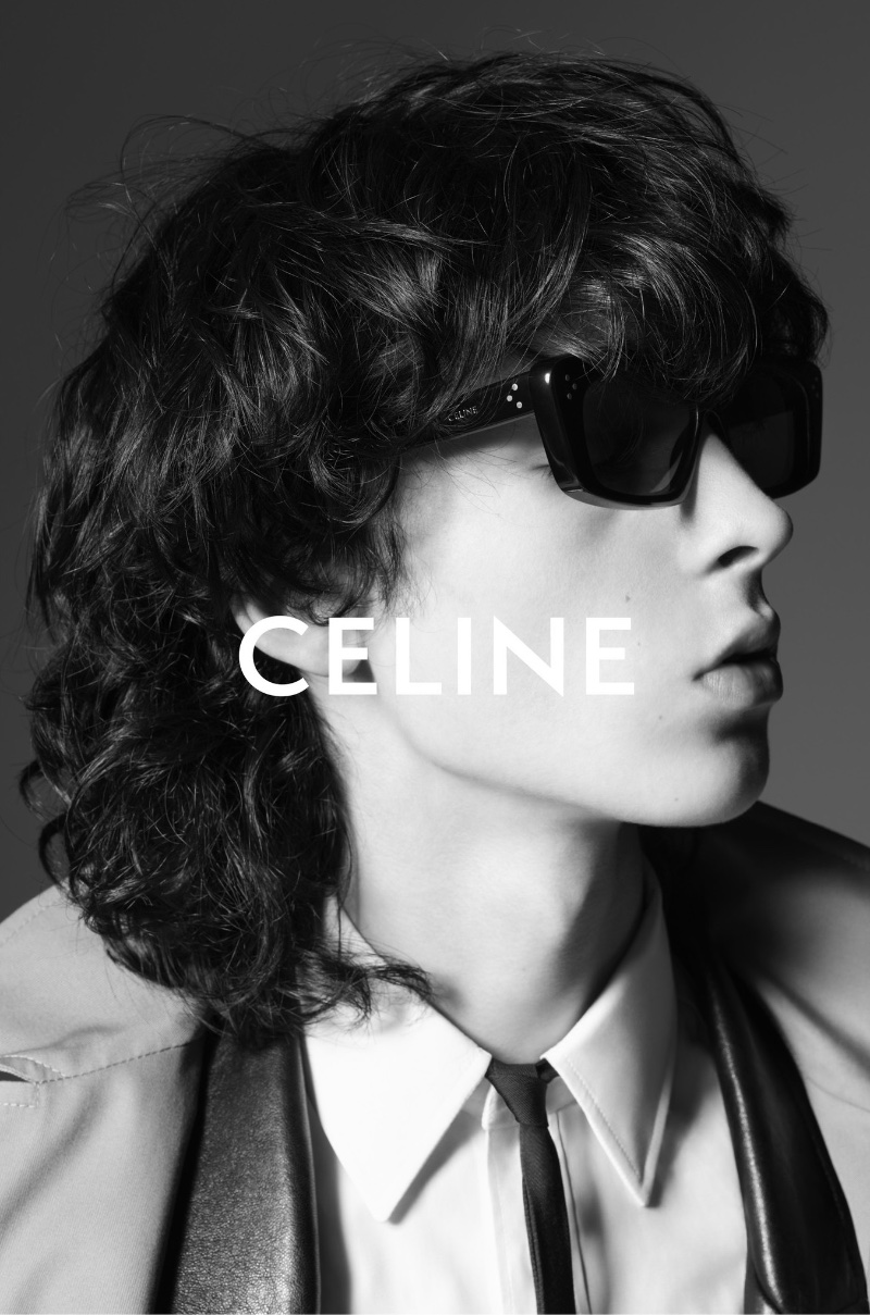 Rocking shades, Artie Aylott fronts Celine Homme's summer 2023 campaign. 