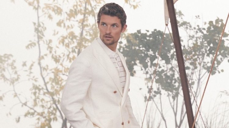 Wouter Peelen wears a white linen double-breasted suit by Brunello Cucinelli.