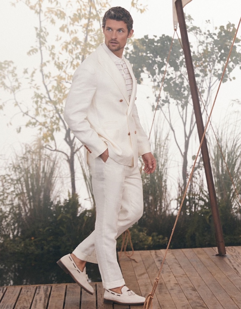 Wouter Peelen wears a white linen double-breasted suit by Brunello Cucinelli. 