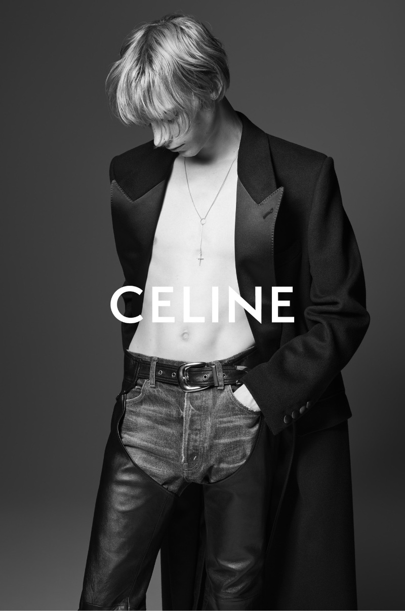 Dressed to make an impression, Toby Jones models a cashmere tuxedo coat with Kurt jeans and leather chaps for Celine Homme's summer 2023 campaign. 