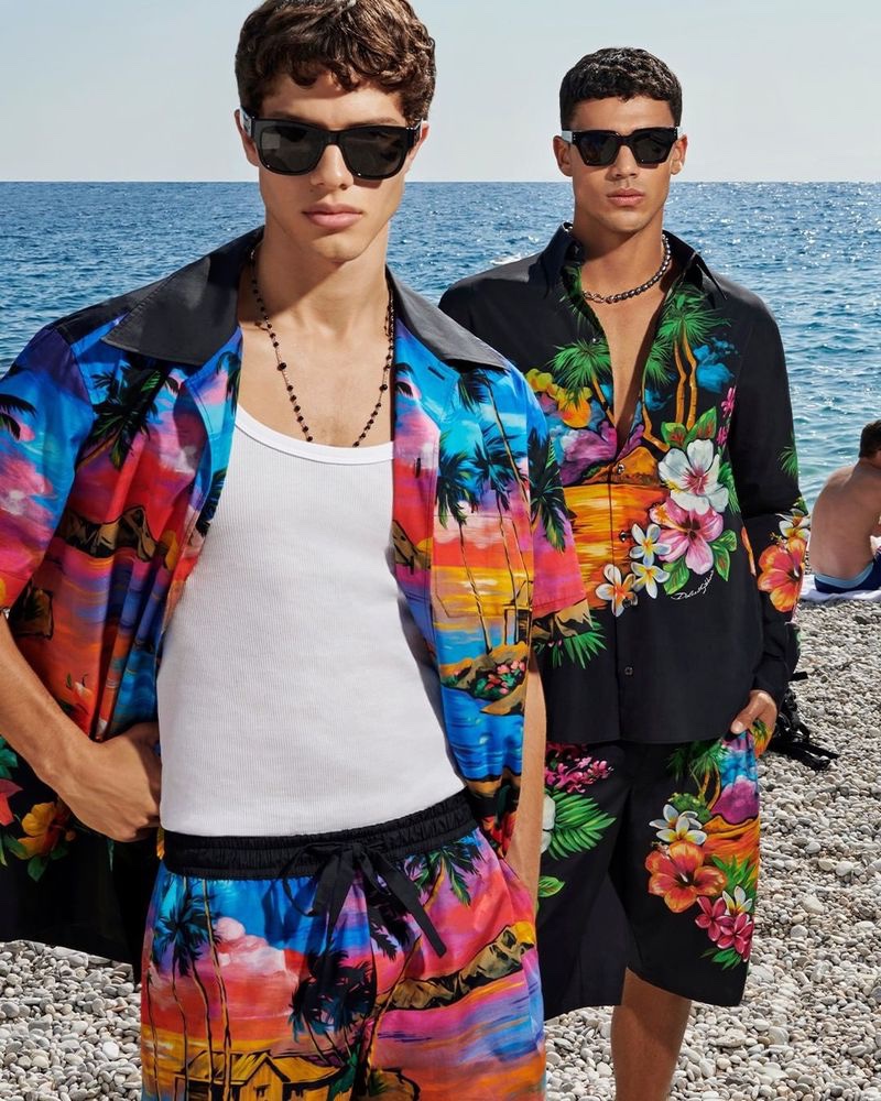 Nacho Penín and João Araujo sport colorful CO-ORD sets from Dolce & Gabbana's spring-summer 2023 collection for men.