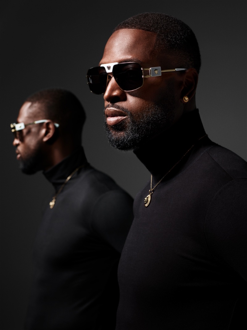 Delivering a side profile, Dwyane Wade models Versace's VE2251 sunglasses for the Italian label's spring 2023 eyewear campaign.