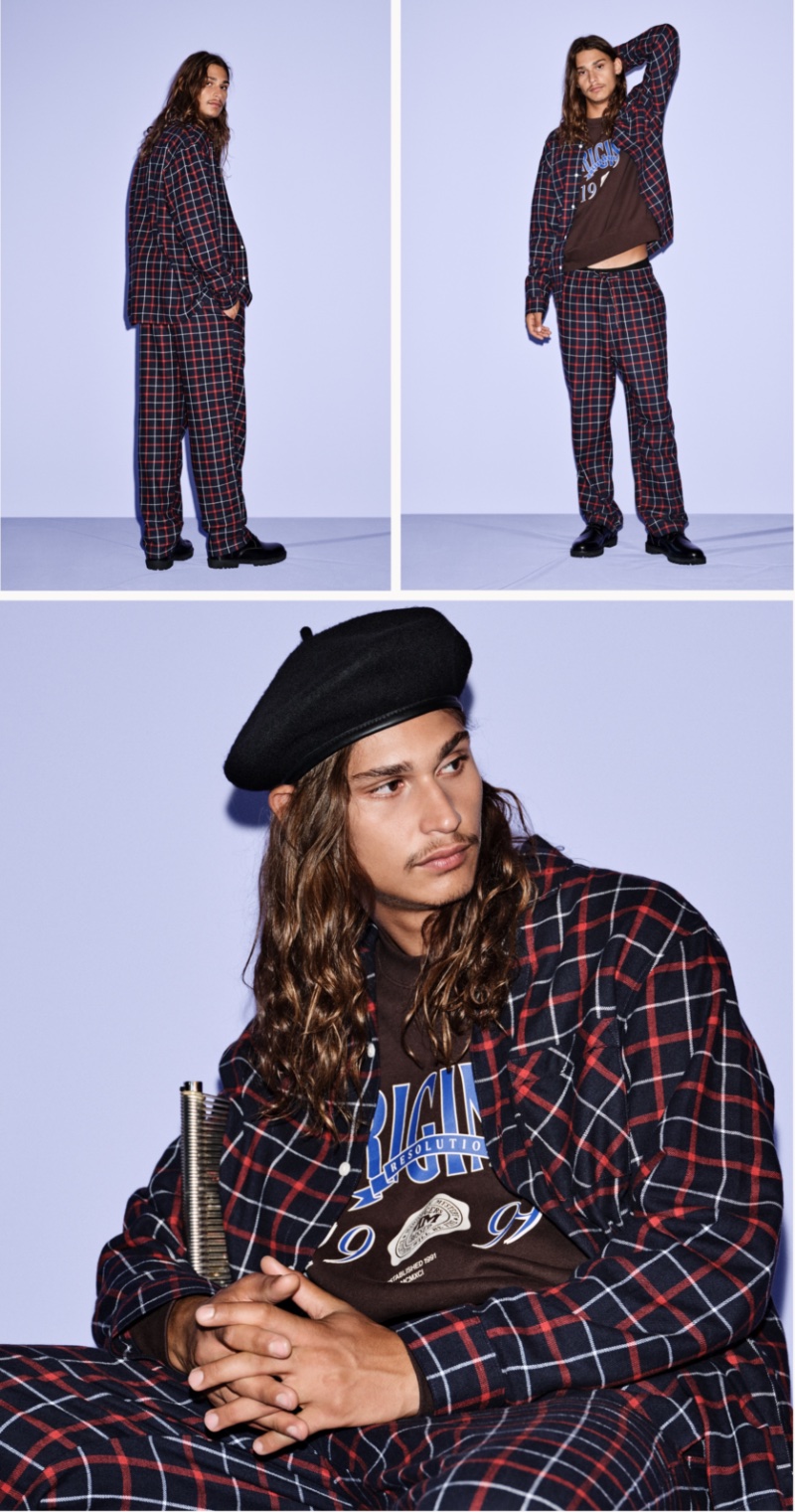Hudson Primo embraces street style in a winter plaid look.