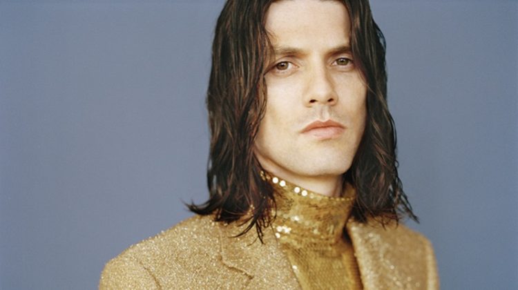 Shining in a gold sequin top and shimmering blazer, James Bay appears in Man About Town.