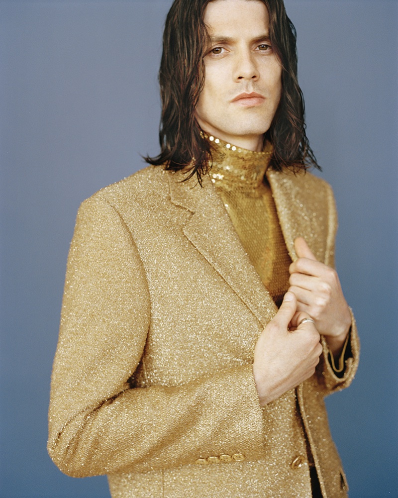 Shining in a gold sequin top and shimmering blazer, James Bay appears in Man About Town.