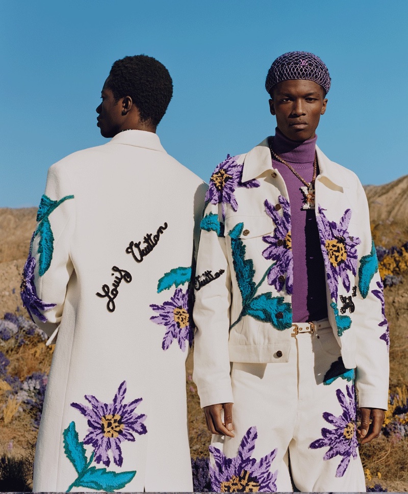 Model Sanoussy Sylla wears a floral look for Louis Vuitton's spring 2023 men's campaign.