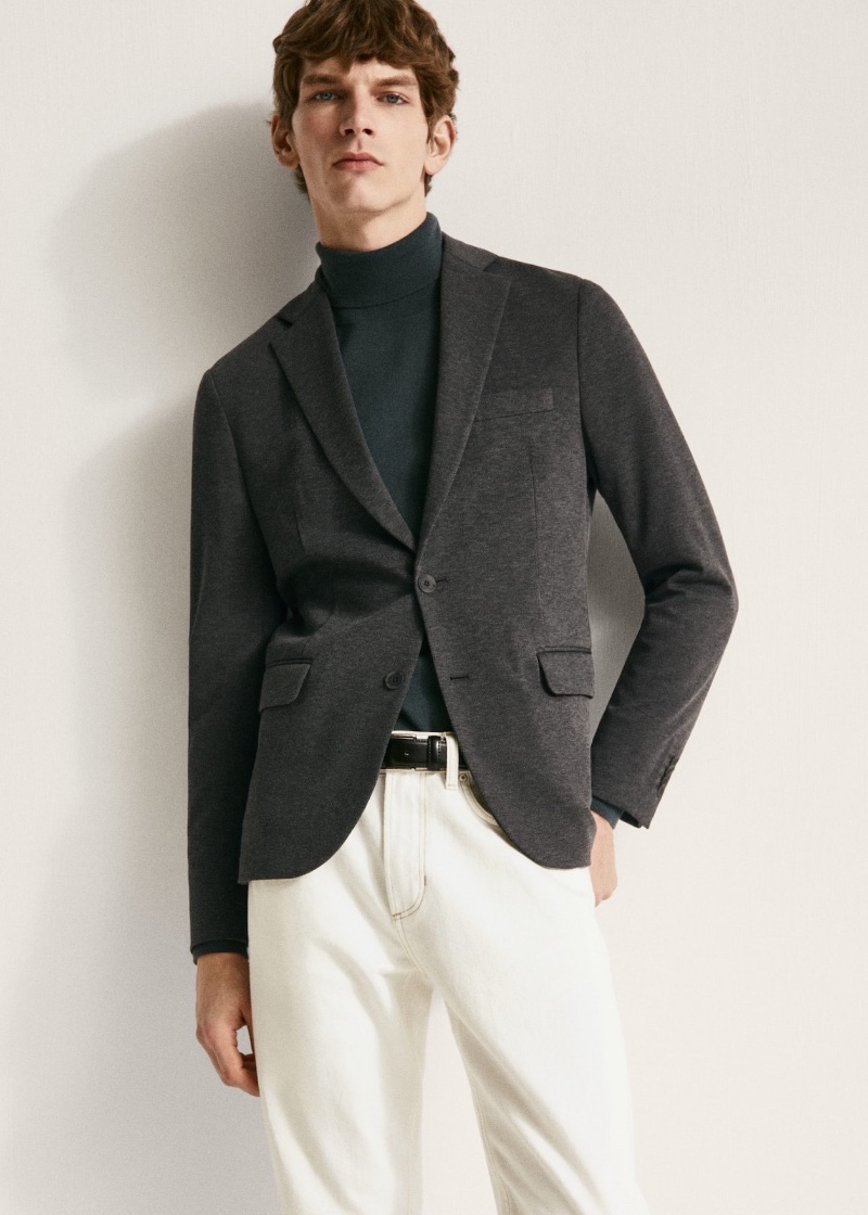 In front and center, Erik van Gils sports a jersey blazer with a turtleneck and white jeans. » Erik van Gils Layers Smart Essentials by Mango In front and center, Erik van Gils sports a jersey blazer with a turtleneck and white jeans.