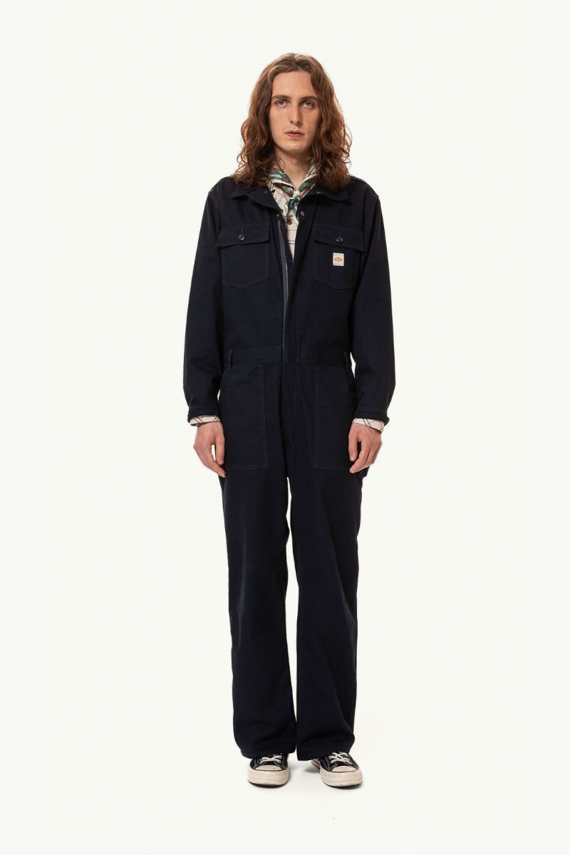 Model Elias Gozal makes a statement in Nudie Jeans' Bernie Boiler Suit Dry. 