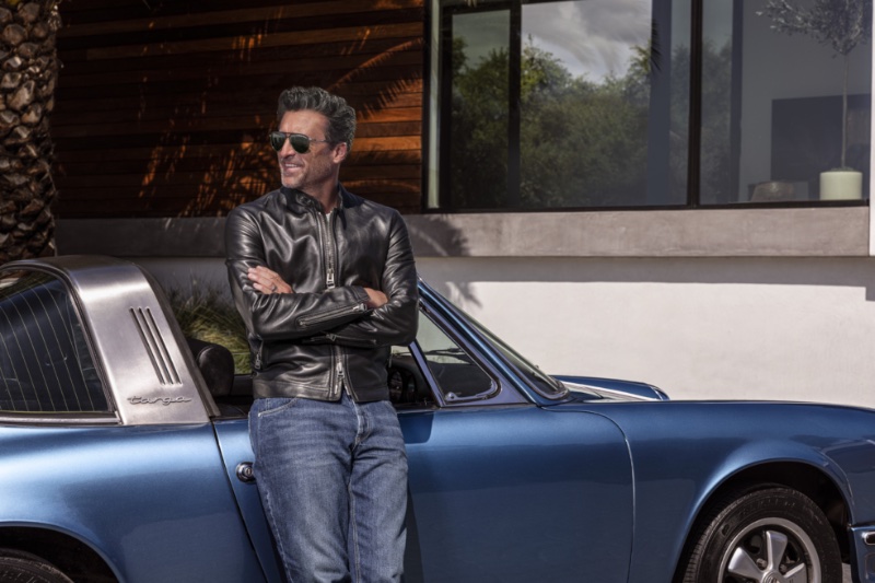 Posing in a leather jacket, Patrick Dempsey wears his new limited-edition Porsche Design sunglasses.