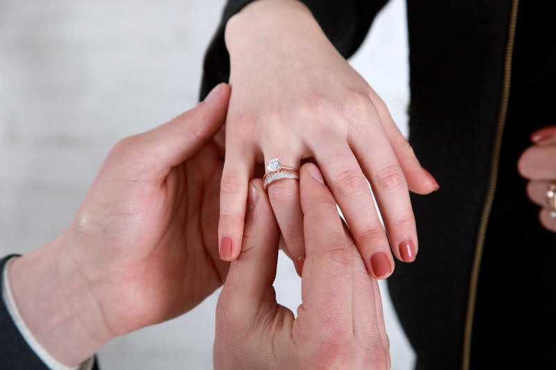 Placing Wedding Ring Engagement Ring Finger