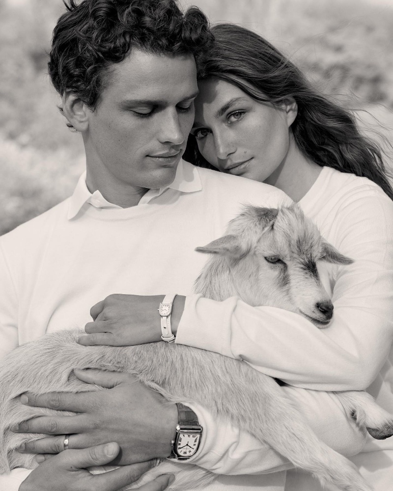 Posing with a goat, Simon Nessman and Andreea Diaconu front Ralph Lauren's Cradle to Cradle Certified® Gold Cashmere Sweater campaign. 