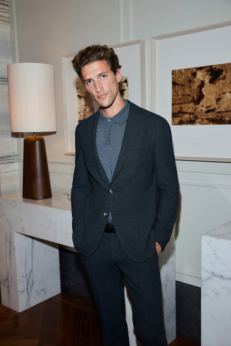 Fabrizio Silva dons a Ramsey suit with a polo.