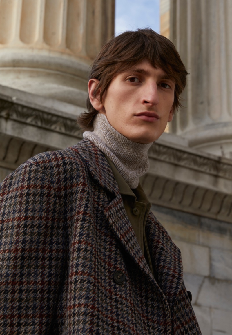 Theodor Pal models a check coat and turtleneck sweater from Slowear's fall-winter 2023 collection. » Slowear Reveals its Latest Multi-Brand Collection Theodor Pal models a check coat and turtleneck sweater from Slowear's fall-winter 2023 collection.