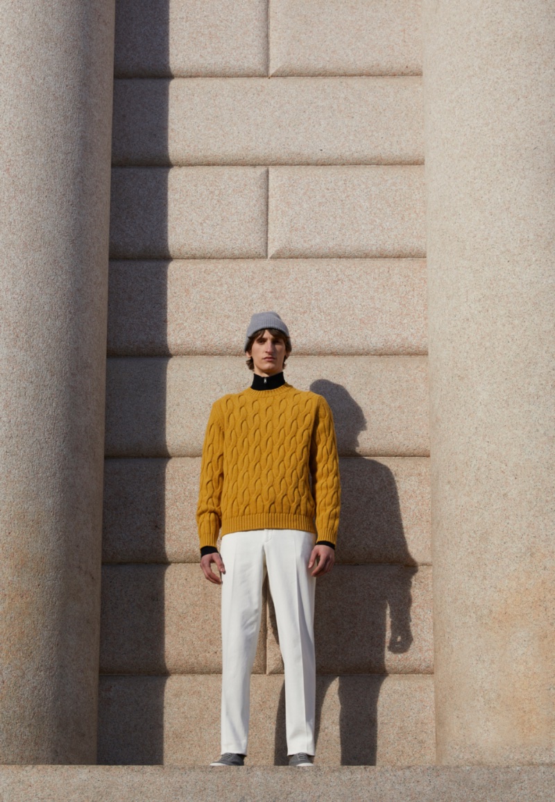 Model Theodor Pal makes a textured statement in a cable-knit sweater with pleated trousers from Slowear's fall-winter 2023 collection. » Slowear Reveals its Latest Multi-Brand Collection Model Theodor Pal makes a textured statement in a cable-knit sweater with pleated trousers from Slowear's fall-winter 2023 collection.