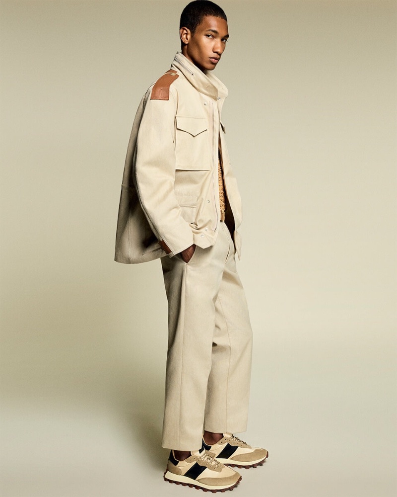 Joshua Seth dons a khaki-colored look for Tod's pre-spring 2023 campaign.