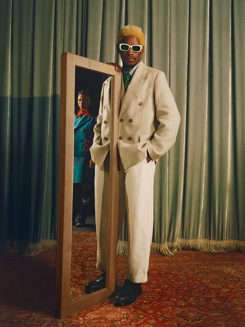 Donning linen tailoring, A$AP Nast wears his Warby Parker Cloud White NST2-002 sunglasses.