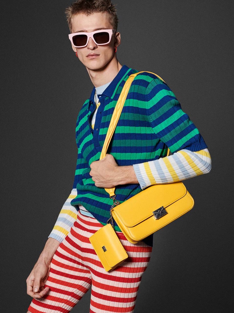 Vasko Luyckx sports striped clothing for Benetton's spring-summer 2023 campaign.