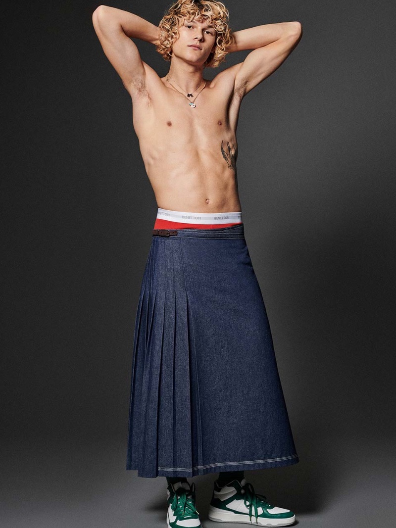 Daniil Kercz dons a denim skirt for Benetton's spring-summer 2023 campaign. » Benetton Infuses Fun Into Spring with New Campaign Daniil Kercz dons a denim skirt for Benetton's spring-summer 2023 campaign.