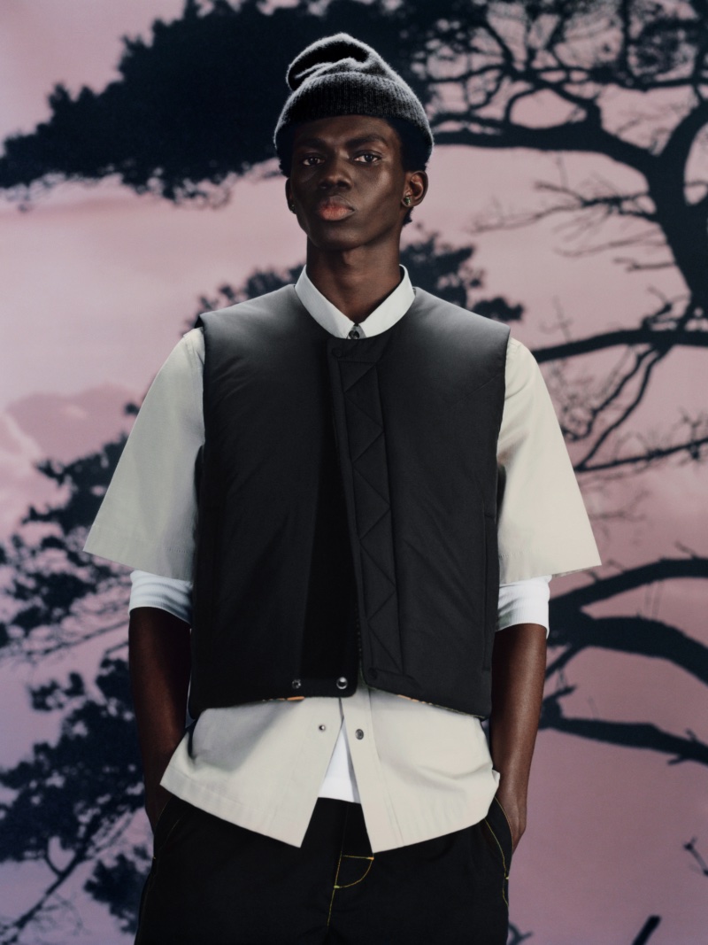Ottawa Kwami rocks a workwear-inspired look from the COS x YEBOAH Metamorphosis collection. 