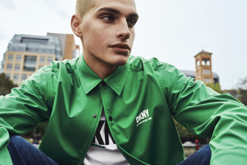 Cameron Porras sports a green coach jacket for DKNY's spring-summer 2023 campaign.