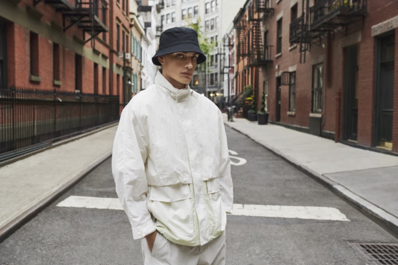 Rocking a bucket hat and casual look, Cameron Porras stars in DKNY's spring-summer 2023 campaign.