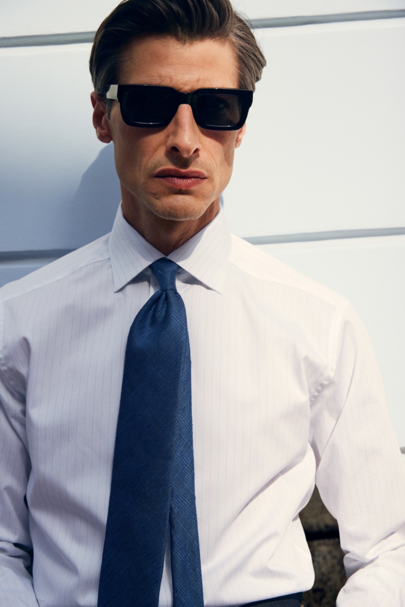 Jonas Mason dons a smart shirt and tie for Eton's spring-summer 2023 campaign.